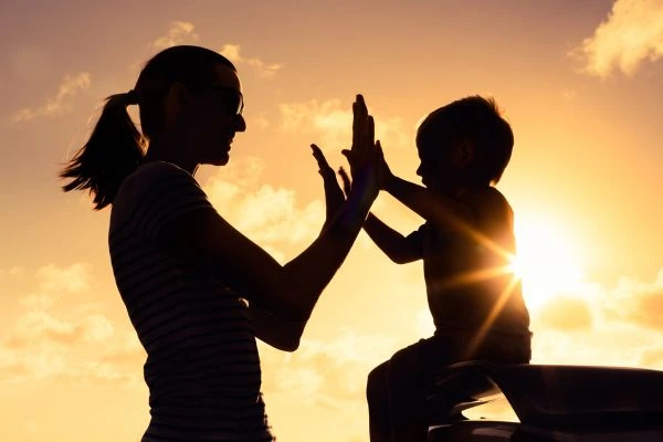 Image of happy mother and child after resolving child arrangements Telford